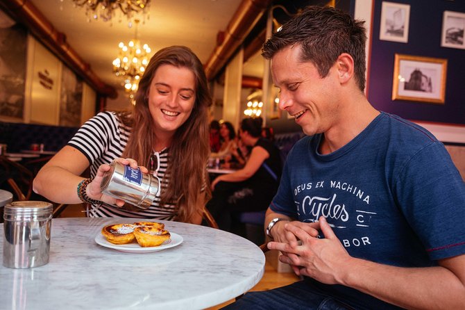 Porto Private Food and Drink Tasting Tour with Local - Pork sandwiches, cod cakes, and neighborhood stops