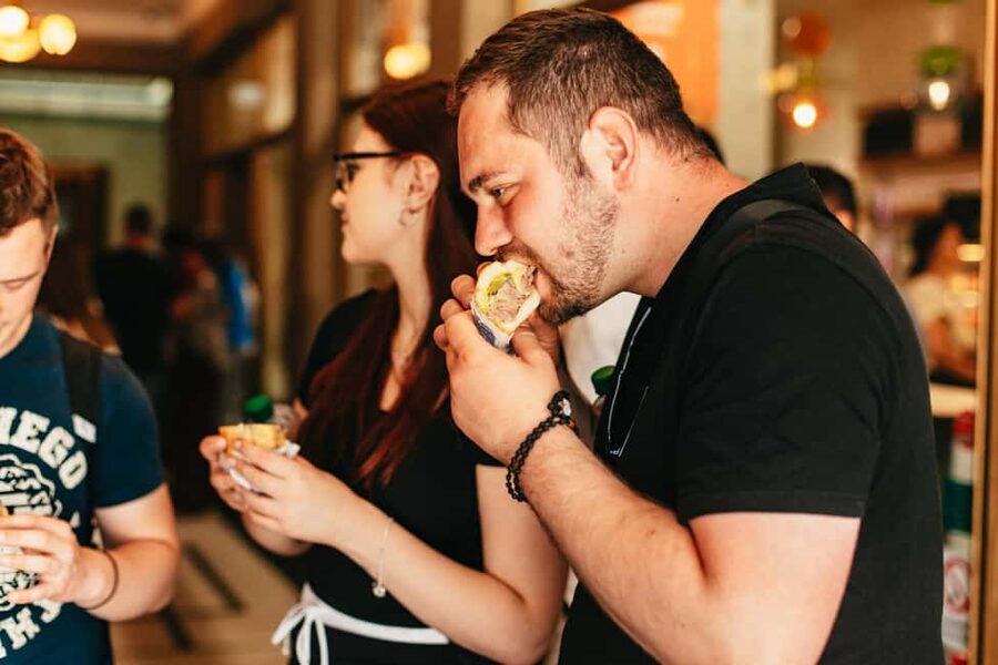 Prague: Guided Street Food Walking Tour - Walking through Prague’s Old Town between bites