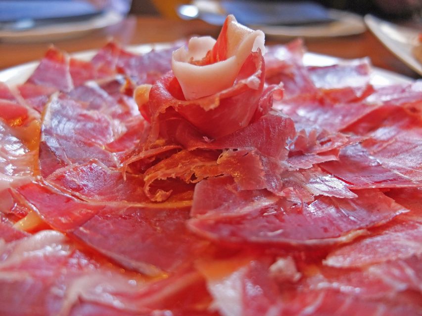 PREMIUM TAPAS TOUR: Paella, Market Tastings, and Winery - The short city walk links food with Málaga’s center