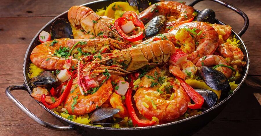 PREMIUM TAPAS TOUR: Paella, Market Tastings, and Winery - At Antigua Casa de Guardia, Málaga wine comes with a story