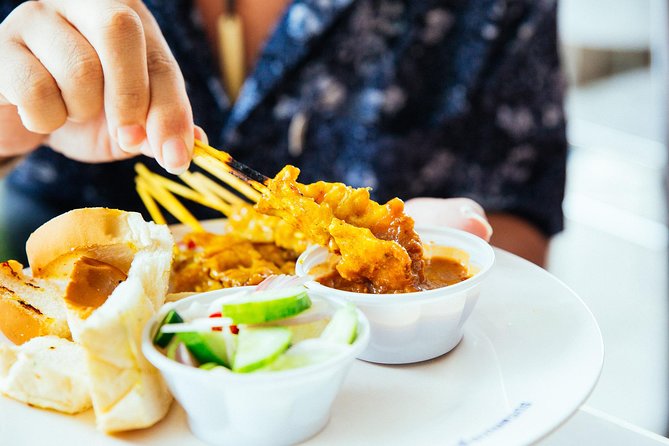 Private Culinary Kickstart Tour of Bangkok with a Local - The first tastes: salad, curry, and banana fritters
