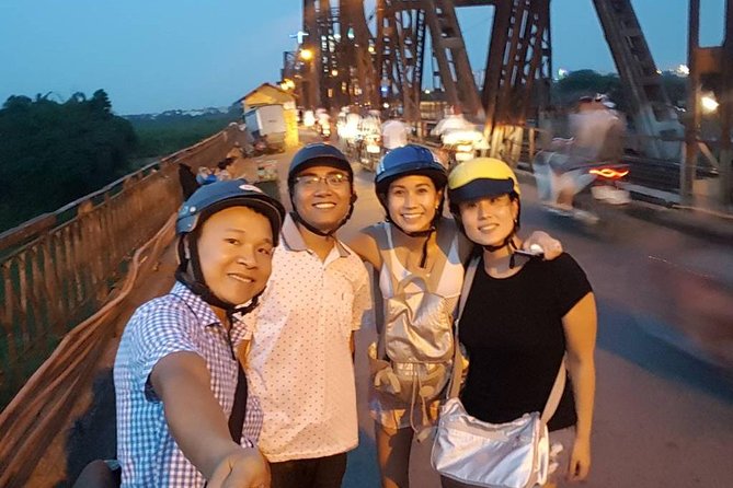 Private Hanoi Motorbike Sightseeing and Food Tour - Old City Gate and the railway street