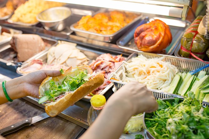 Private Street Food Evening Walking Tour in Ho Chi Minh City - Bo la lot and the main savory stop