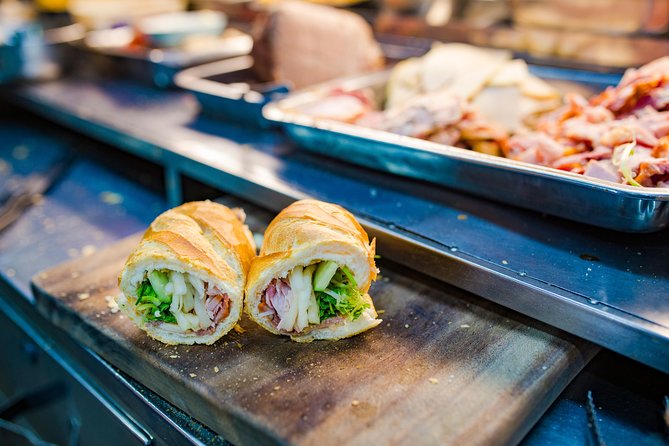 Private Street Food Evening Walking Tour in Ho Chi Minh City - What the guides add to the evening