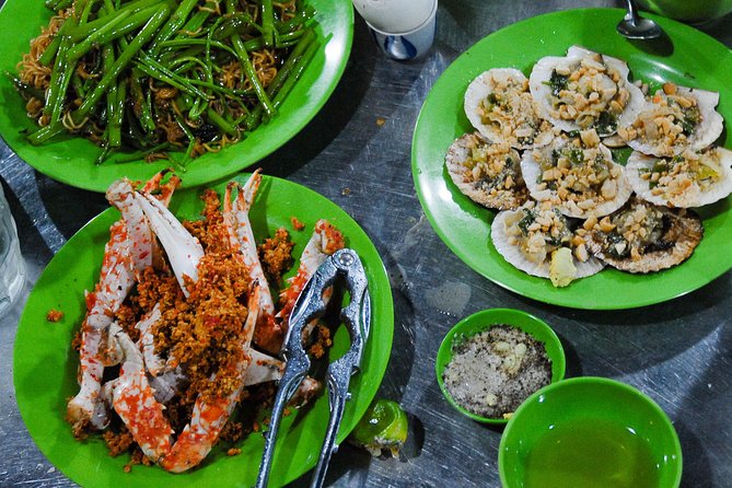 Private Street Food Motorbike Tour in Ho Chi Minh City - District 10, the flower market, and a taste of evening life