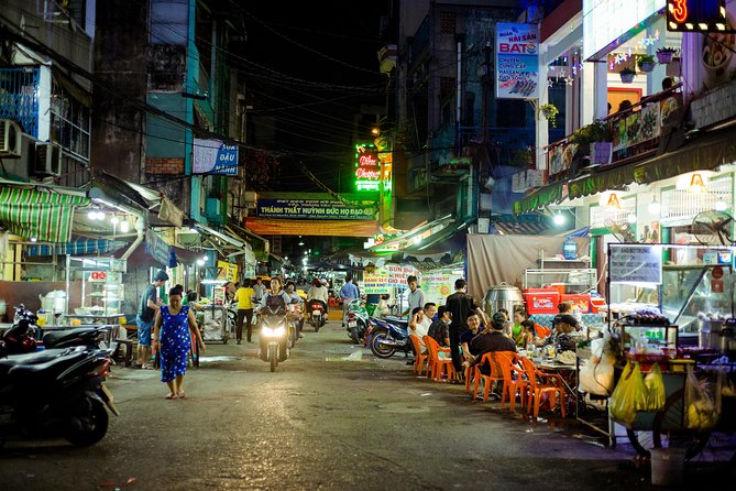 Private Vegan Food Tour By Scooter in Ho Chi Minh City - District 5 and District 4 after dark