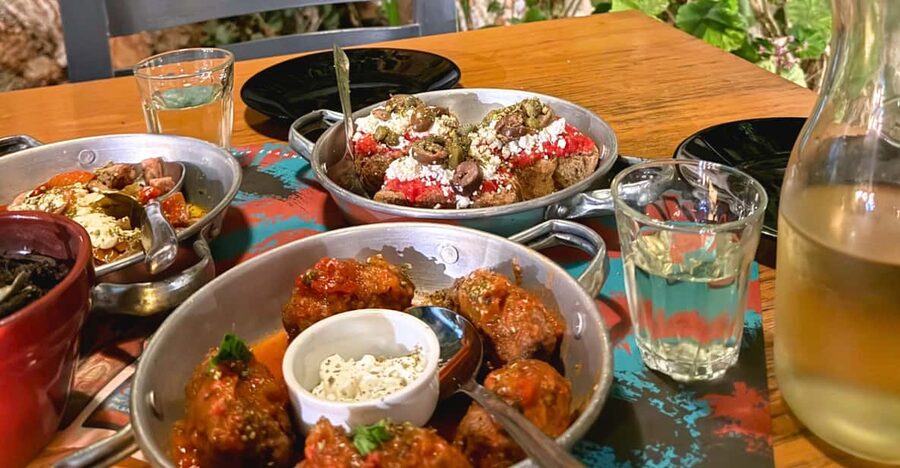 Rethymno Old Town: A Traditional Cretan Food Tour - The secret tavern, rakomelo, and shared meze