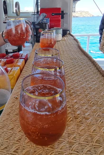 Rhodes: Boat Tour with Snorkeling, Gourmet Buffet & Open Bar - The return to Mandraki Port