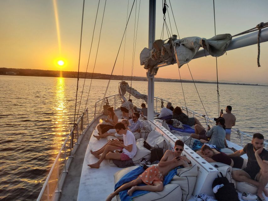 Rhodes: Sunset Cruise w/ Gourmet Buffet, Drinks & Live Music - Sunset, familiar songs, and a little romance