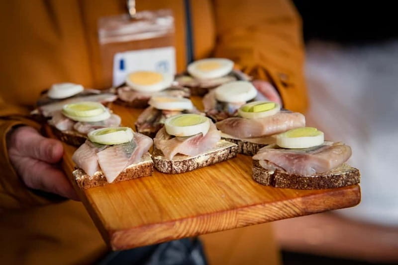 Riga: Central Market Traditional Food Tour in a Small Group - Inside the Zeppelin hangars: a guided introduction
