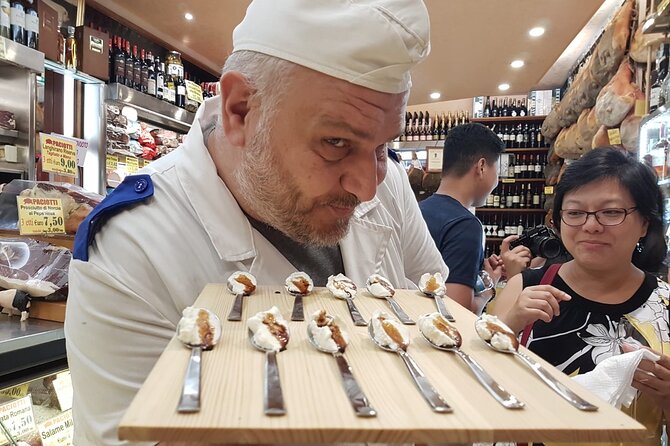 Rome Food Tour: Unlimited Tastings with Fine Wine & Barolo - Paciotti Salumeria focuses on cured meat and family trade