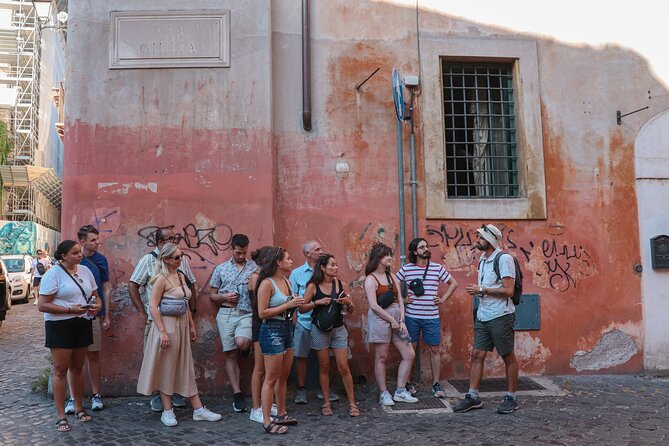 Rome Food Tour & Wine: Trastevere & Campo de' Fiori Like a Local - Fried hake and wine at Dar Filettaro