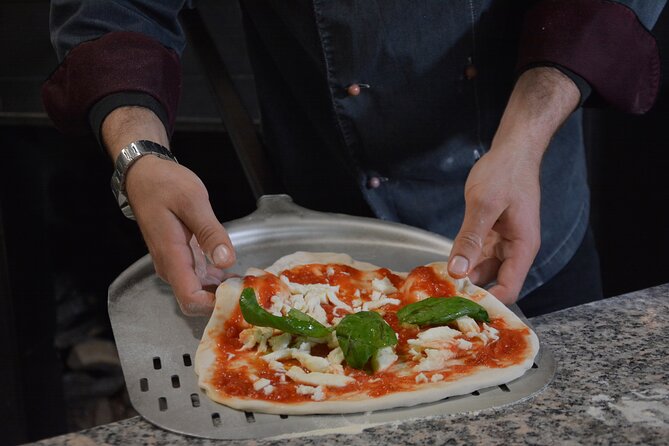 Rome: Pizza Making Class Small Group Experience - Choosing toppings and baking your pizza
