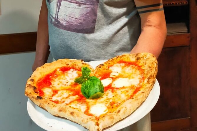 Rome: Pizza & Tiramisu Class with Free Flowing Fine Wine - Eating what you make with wine at the table