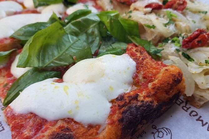 Rome: Trastevere Food tour with Free-Flowing Fine Wine - Pizza, craft beer, and Roman comfort food