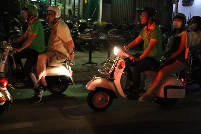 Saigon After Dark Vespa Street Food Tour + Live Music 4 hours - Banh xeo and nem lui in the second food stop