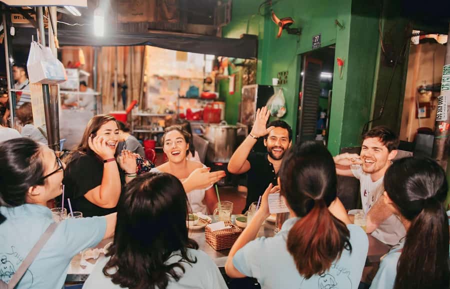 Saigon: Best Price Authentic Food Tour with Female Rider - Rolls, oysters, and local snacks