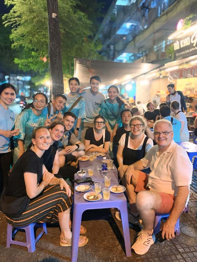 Saigon: Best Price Authentic Food Tour with Female Rider - Banh Mi at a student food area
