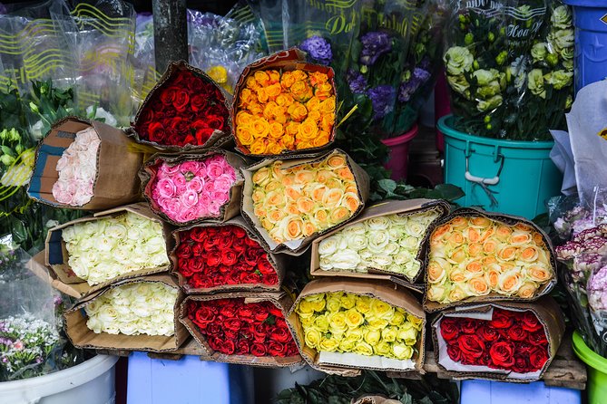 Saigon Evening Food Tour by Scooter - Moving beyond District 1 for a fuller view of the city