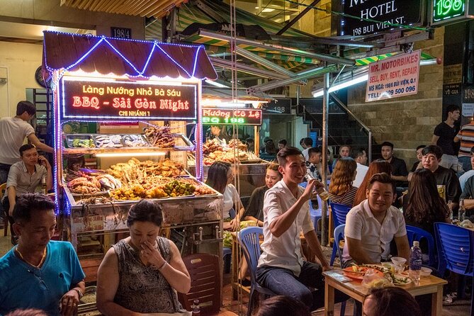 Saigon Night Bites on Foot: Local Vendors, Stories & Sweet Finish - What guides add to the evening