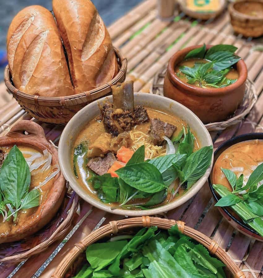 Saigon: Private Backstreets Walking Food Tour - Flower market, Cambodian market, and street snacks
