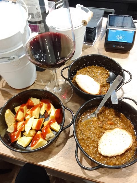 Santiago: Guided Foodie Tour with Drinks, Tapas & Live Music - Three bars and a useful lesson in Galician tapas
