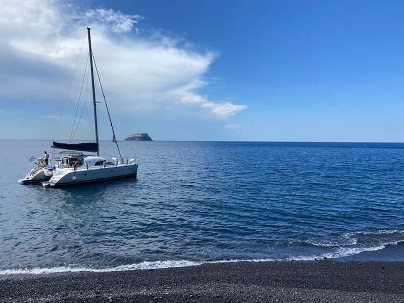 Santorini: Catamaran Cruise with Food and Drinks - Red Beach, White Beach, and the southern coast