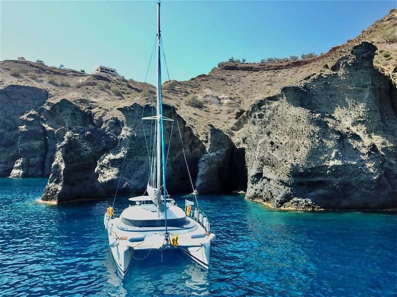 Santorini: Catamaran Cruise with Food and Drinks - Warm water near Palea Kameni
