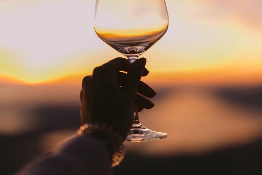 Santorini: Sunset Walking Tour with Local Food and Drinks - Caldera views, local sweets, and the first tastes