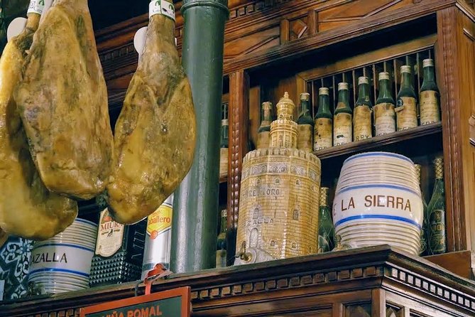 Sevilla Food Tour: Tapas, Wine, History & Traditions - Alfalfa, tostas, and a local tavern atmosphere
