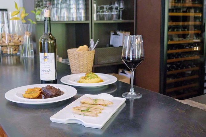Sevilla Food Tour: Tapas, Wine, History & Traditions - Santa Cruz, family cooking, and a PX finish