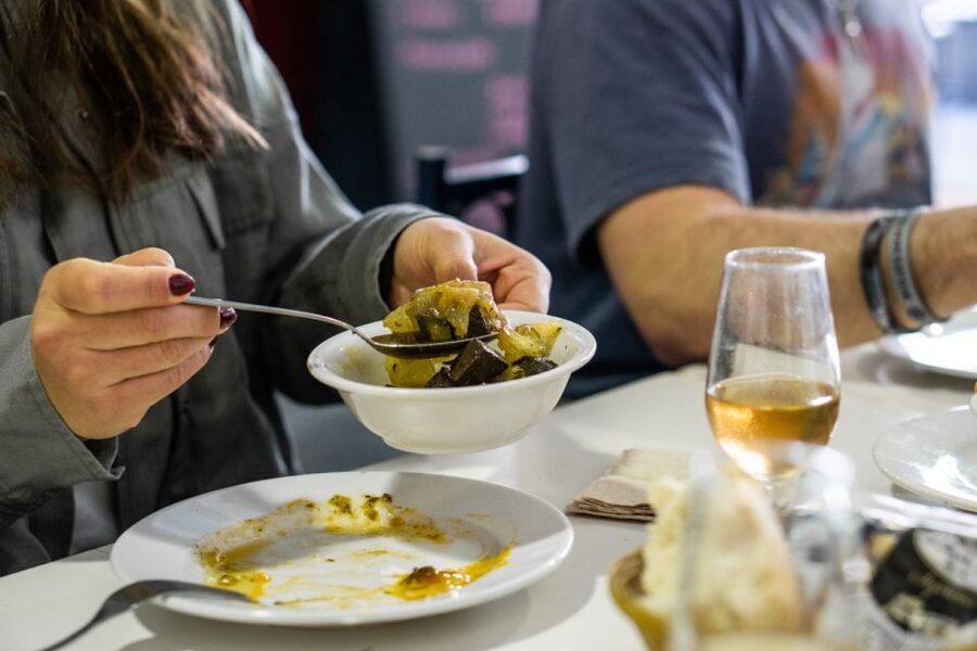 Seville: Flavors of Andalucía Guided Food Tour with Tastings - The first tapas bar: a local introduction