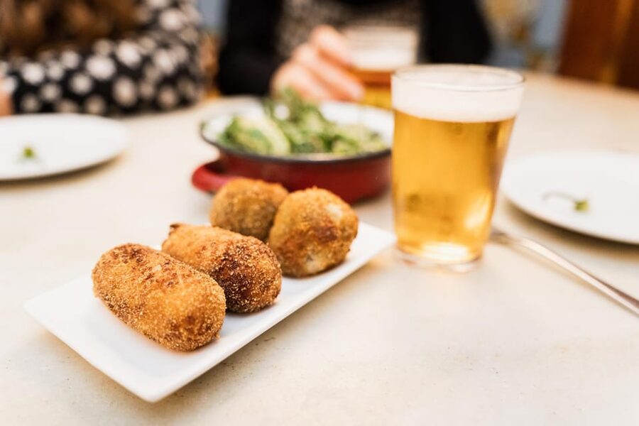 Seville Food Tour with Tapas & Drinks with a Local - Starting beside the Archivo de Indias