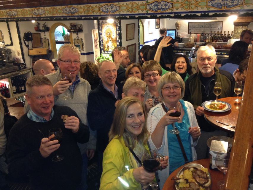 Seville: Tapas Tour Across the River in Triana - Crossing the Isabel II Bridge into Triana