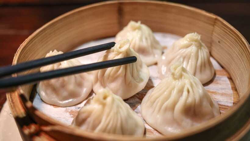 Shanghai: Evening Walking Food Tour - The carbohydrate course: noodles, dumplings, and pan-fried buns