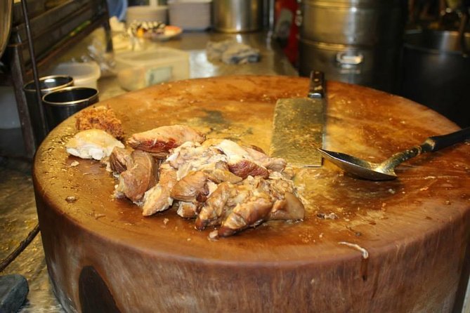 Small-Group Chiang Mai Evening Street Food Tour - Riding a songthaew through the city
