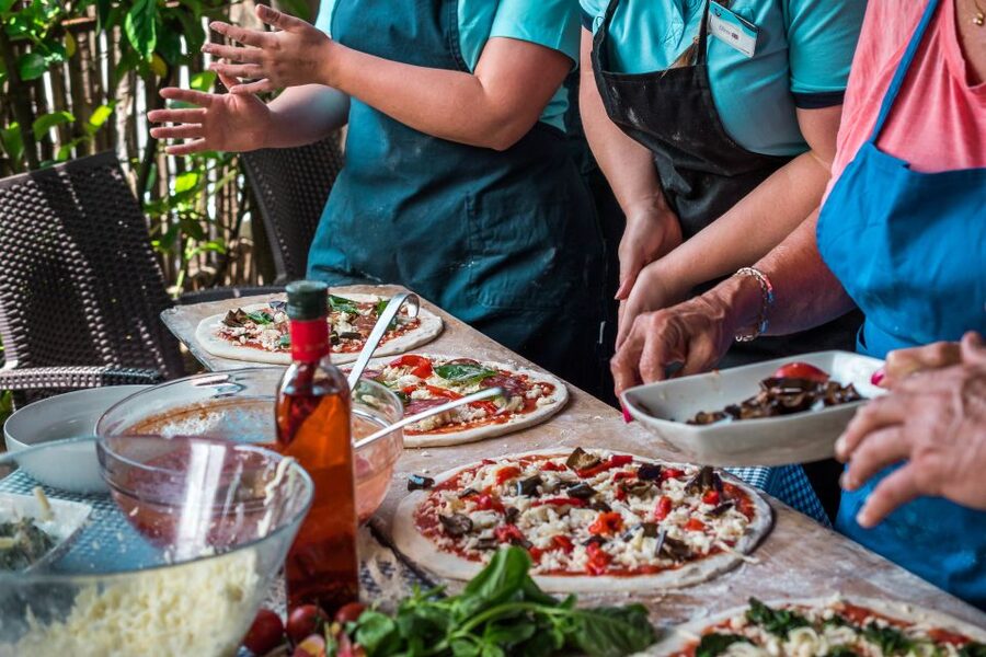 Sorrento: Pizza Making Class at Tirabusciò Cooking School - Choosing toppings and making a real lunch