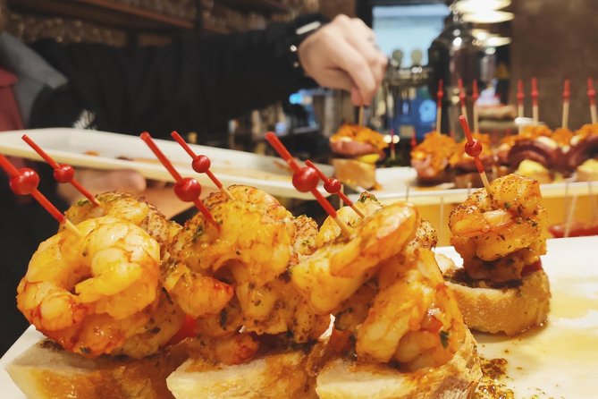Spanish Wine and Tapas Tour in a Local Neighborhood in Barcelona - What happens at the first meeting point