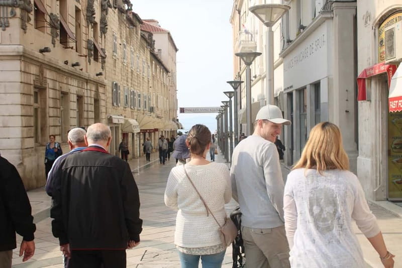 Split: Small Group Food Tour with Private Option - Walking through the palace with a local guide