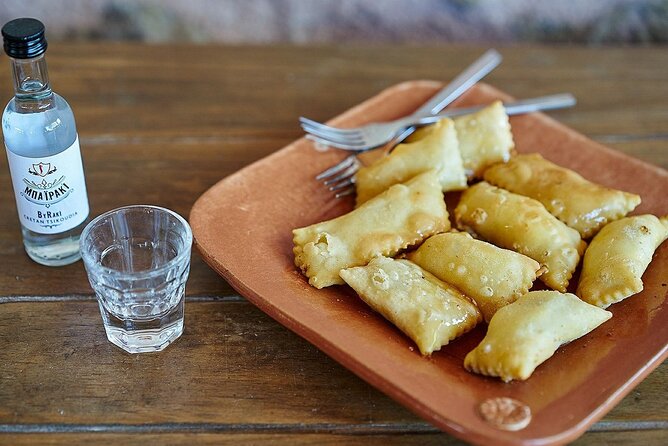Tastes of Athens: Your Private Greek Feast Tour - Meze, wine, and Greek drinking customs