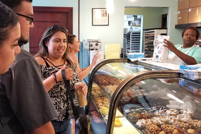 Top 10 Sites + Bites of Cincinnati Tour with Riverside Food Tours - Music Hall and Washington Park on the way north