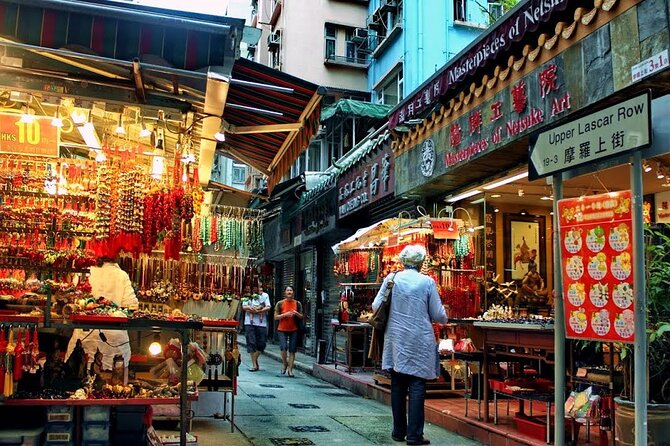 Top-Rated Hong Kong Tour: Peak Tram, Dim Sum & Cultural Sights - Entering Man Mo Temple on Hollywood Road