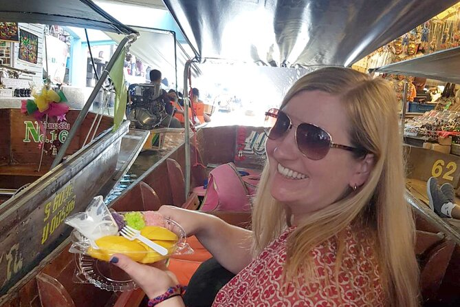 Train & Floating Market Food Adventure + Scenic train ride - Taking a boat through Damnoen Saduak