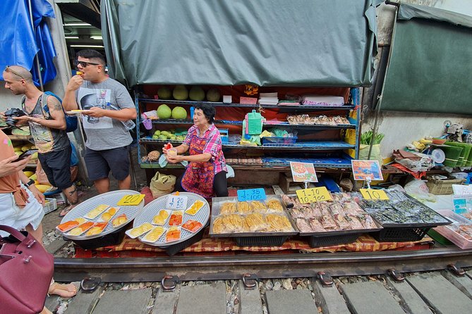 Train & Floating Market Food Adventure + Scenic train ride - What the $86.38 price covers