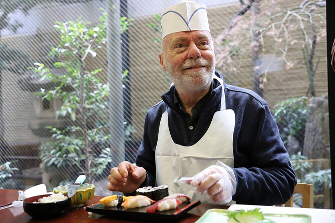 Tsukiji Fish Market Guided Tour and Sushi Making with Pro Chef - Learning sushi in a traditional classroom