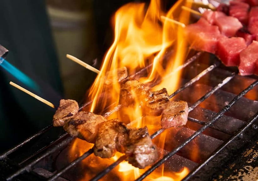 Tsukiji Fish Market: Street Food & Culture Walking Tour - Eating Through Tsukiji Jogai Market
